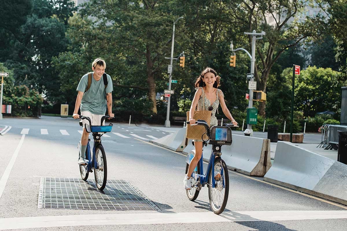 Couple riding bikes in the city