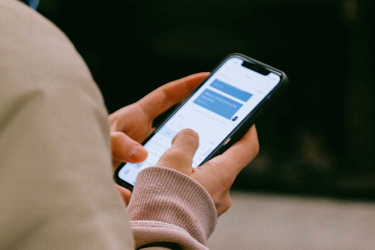 Person texting on phone