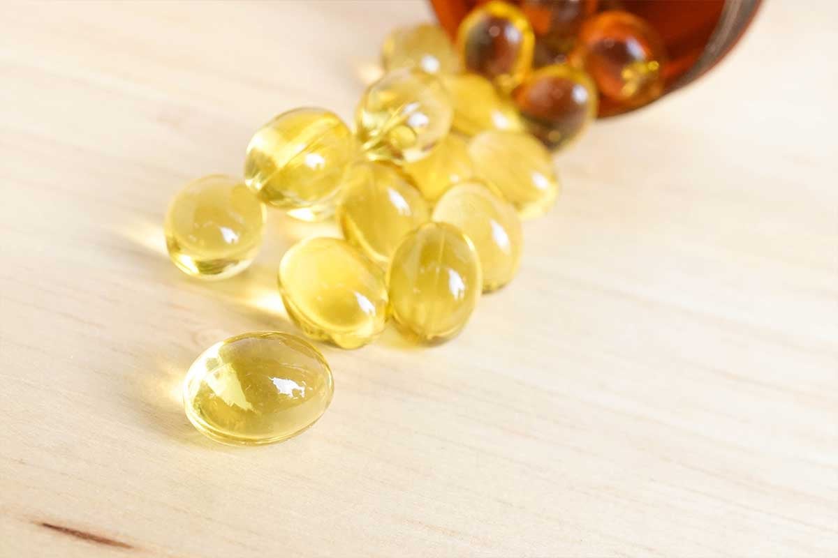 Pills spilling out of a bottle 